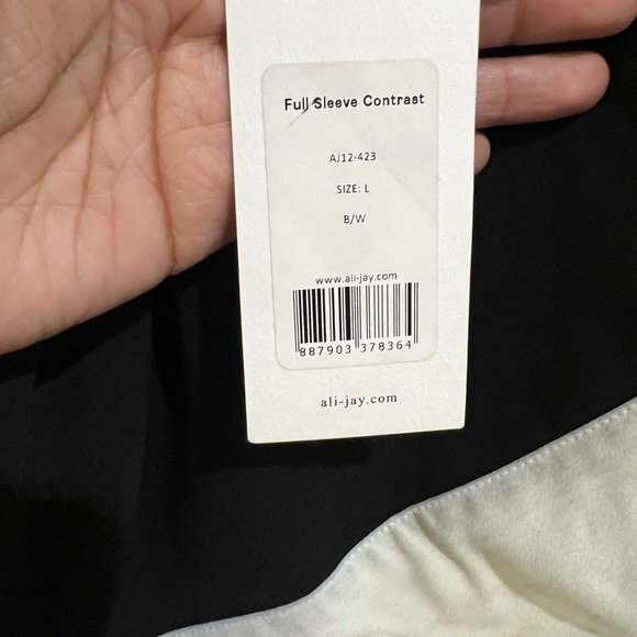 ALI & JAY Elegant Black Dress with White Accents - Picture 8 of 10